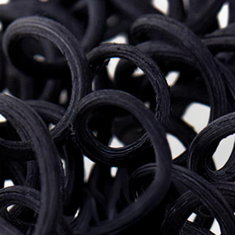 a close up of Black Spiral Diffuser Reeds showing the curling rattan