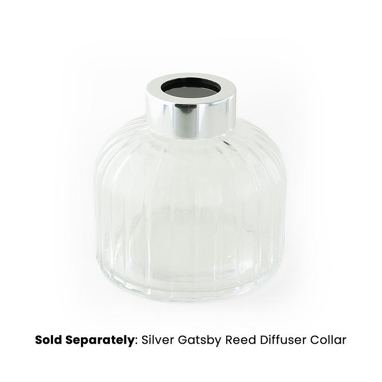 Gatsby Reed Diffuser Bottle with a silver gatsby collar on a white background