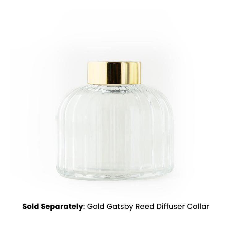 Gatsby Reed Diffuser Bottle with a gold gatsby collar on a white background