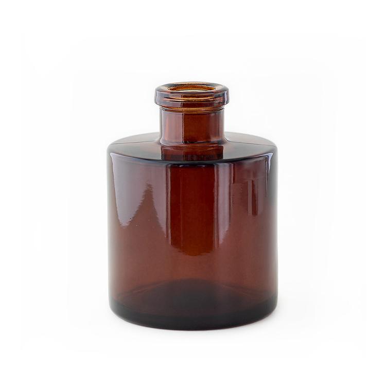 Amber Round Reed Diffuser Bottle on a white background