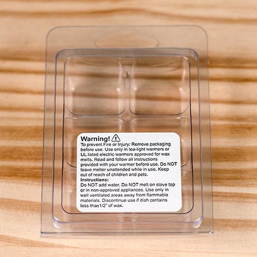 wax melt warning label on front of clamshell packaging