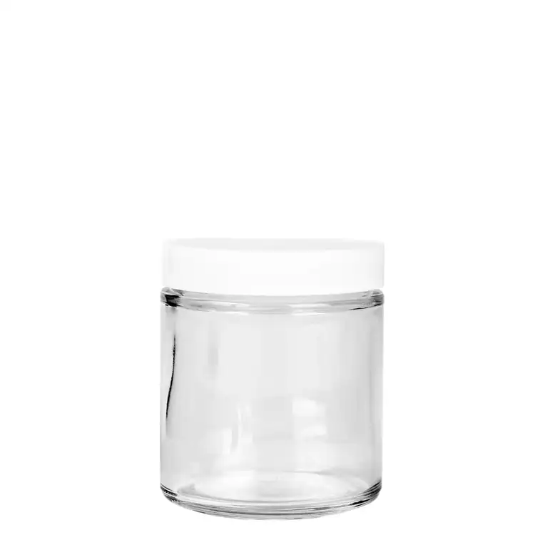 58-400 White Plastic Threaded Lid on top of a glass straight sided jar