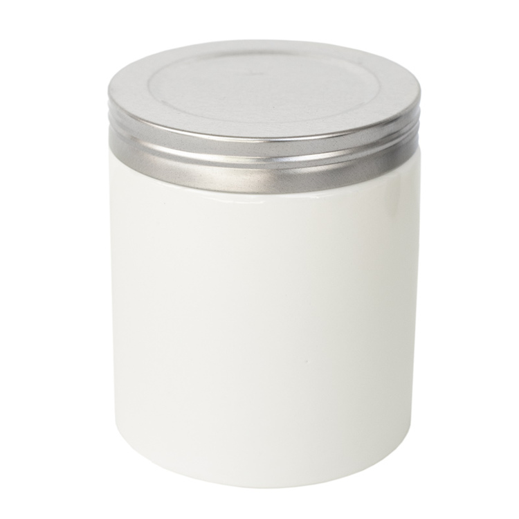 Faux threaded lid silver on white farmhouse ceramic jar.