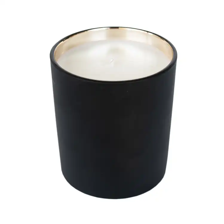 Matte black tumbler jar with candle.