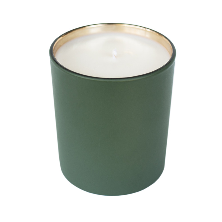 Green matte tumbler jar with candle.