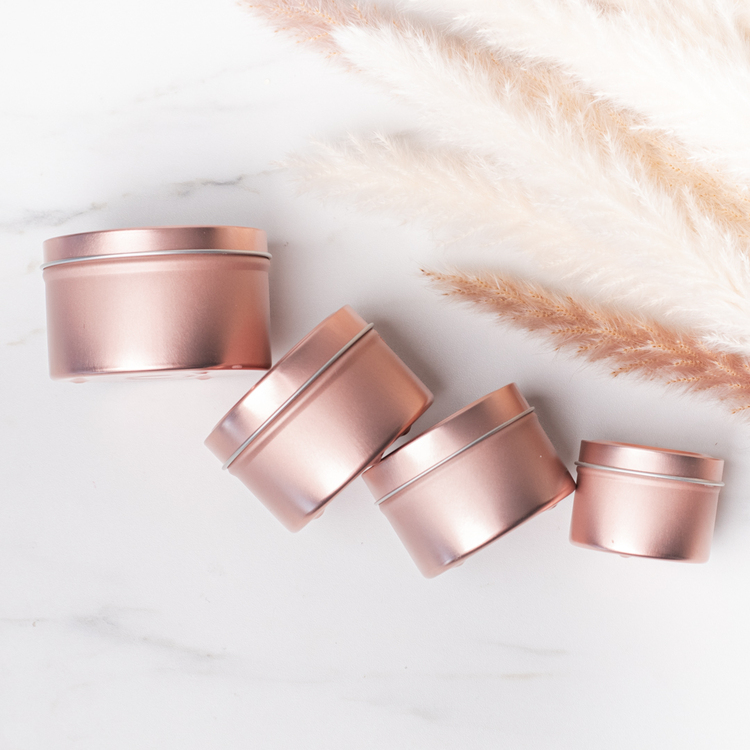 Group photo of 2, 4, 6, and 8 oz Rose Gold Candle Tins on side