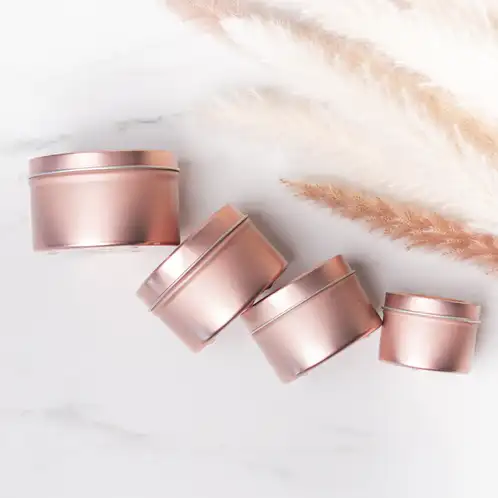 Group photo of 2, 4, 6, and 8 oz Rose Gold Candle Tins on side