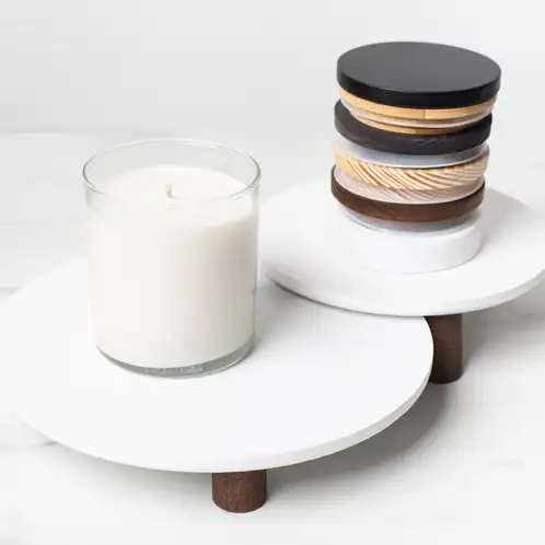 Studio Tumbler Jar with pile of lids