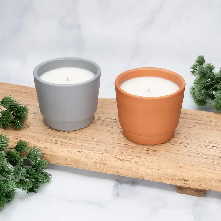 Gray Terracotta Pot and Natural Terracotta Pot Candles on Wood