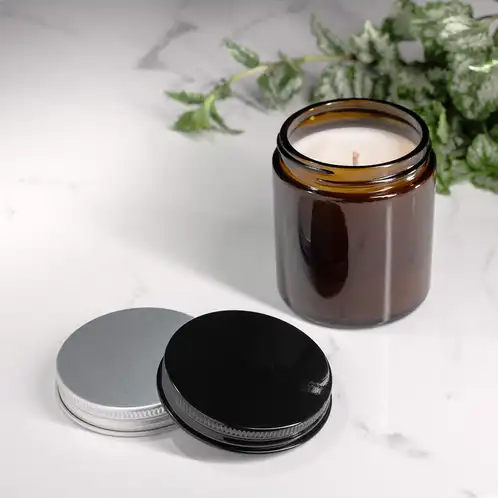 Small Amber Straight Sided Jar (Threaded) filled with candle and black and silver lid options