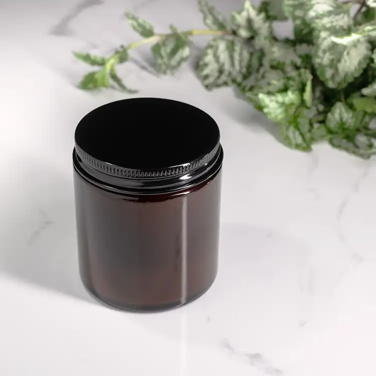 Small Amber Straight Sided Jar (Threaded) filled with candle and black lid