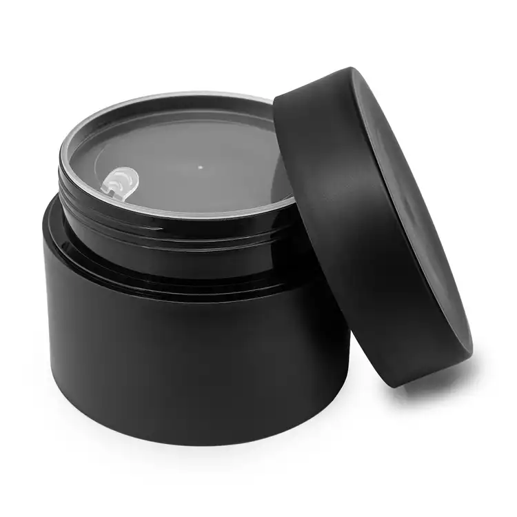 8 oz. Matte Black Double Wall PP Jar empty with safety seal applied and lid on side