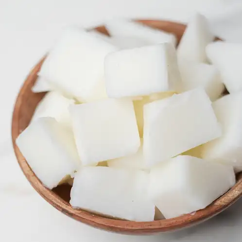 CandleScience Coconut Apricot Wax in chunks in a bowl