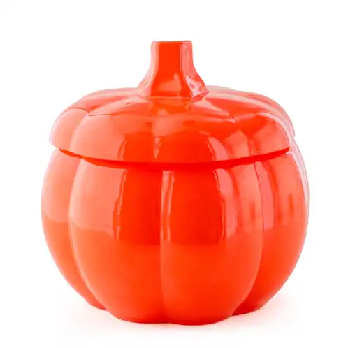 An orange pumpkin jar with a stem lid.