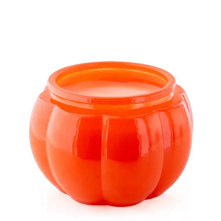 An orange pumpkin jar without a lid.