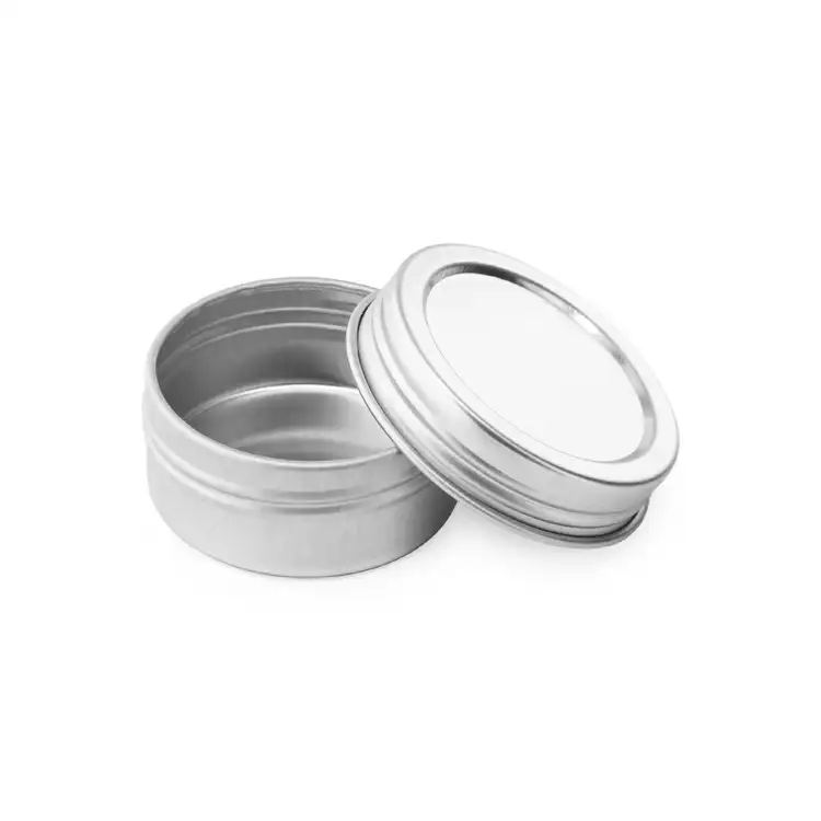 0.5 oz. Flat Tin with Screw Top Lid with lid partially removed