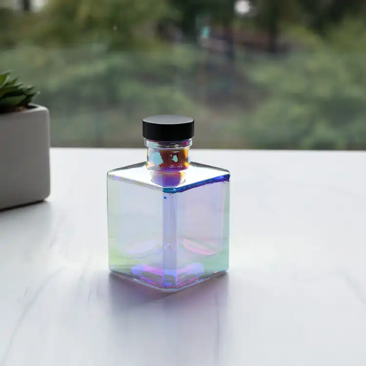 Prism Cube Reed Diffuser Bottle with Matte Black Bottle Stopper in front of window