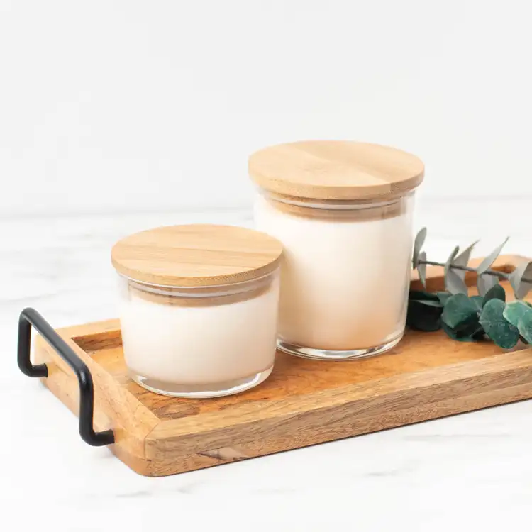 13.25 oz. and 7.75 oz Cidra Glass Tumbler Jars with Bamboo Lids on a wooden tray