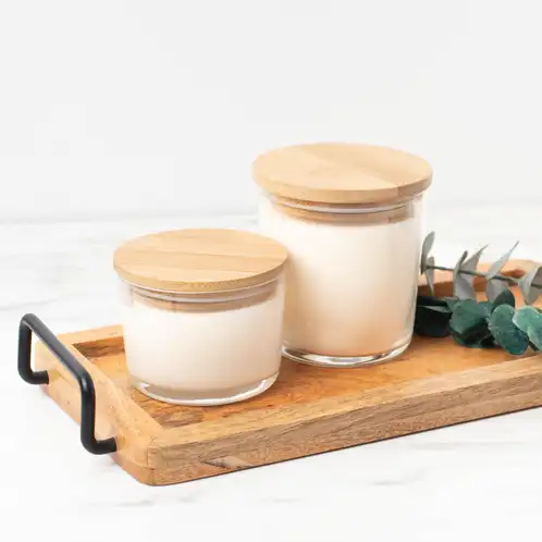 13.25 oz. and 7.75 oz Cidra Glass Tumbler Jars with Bamboo Lids on a wooden tray