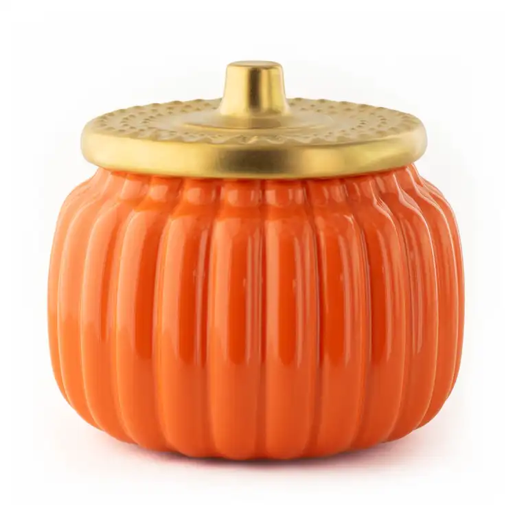 Harvest Orange Ceramic Pumpkin Jar with Gold Matte Lid on a white background