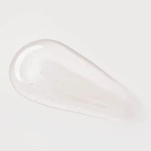 A clear swatch of Stephenson 3-in-1 Bubble Bath Base on a grey background 