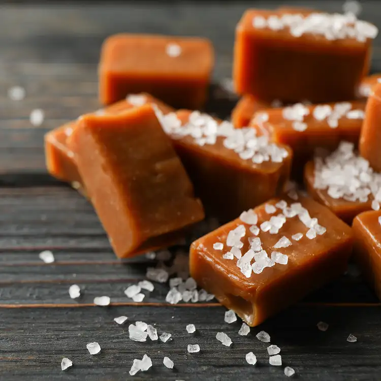Salted Caramel and Oud Fragrance Oil: Homemade caramel squares with a sprinkling of sea salt on oud. 