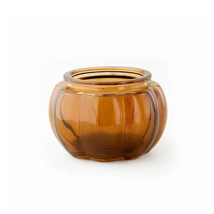 Mini Amber Glass Pumpkin Jar without a lid on a white background