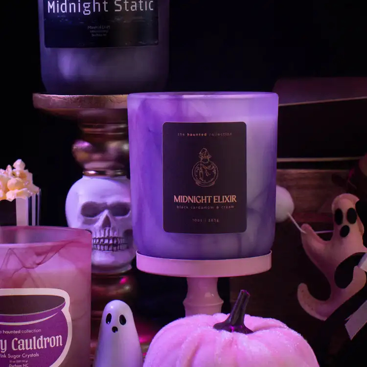 Frosted Purple Swirl Sonoma on a pedestal labeled with a halloween theme