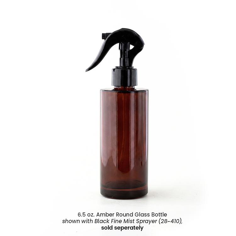 Black Fine Mist Sprayer (28mm-410) on an Amber Round Glass Bottle on a white background