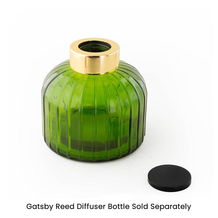 Gold Gatsby Reed Diffuser Bottle Collar on a Green Gatsby Reed Diffuser Bottle on a white background