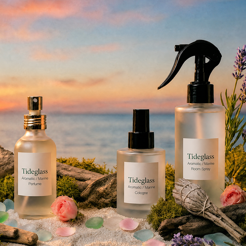 CandleScience EcoBase™ Fine Fragrance Base (water-based) in a perfume bottle, linen spray bottle, and body mist bottle to demonstrate its many uses. 